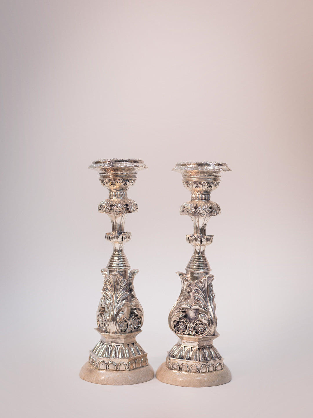 Silver Candle Stand on White Marble Base