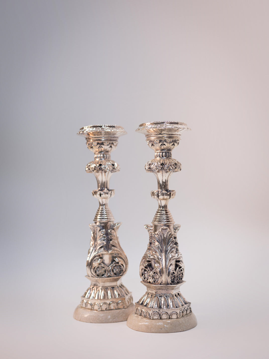 Silver Candle Stand on White Marble Base