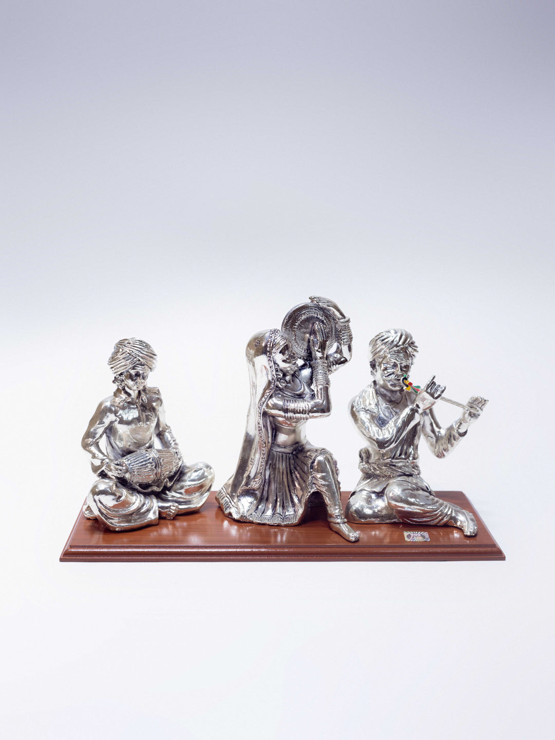 Silver Musical Set of Three People Playing Musical Instruments