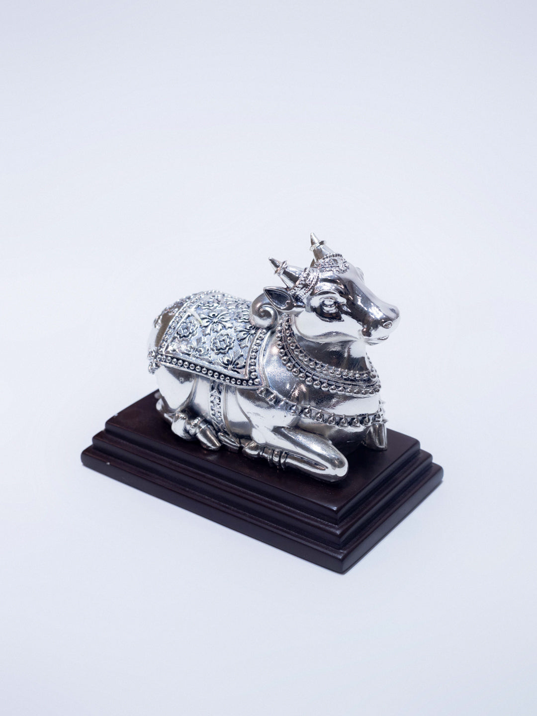 Silver Nandi Sitting on Wooden Base