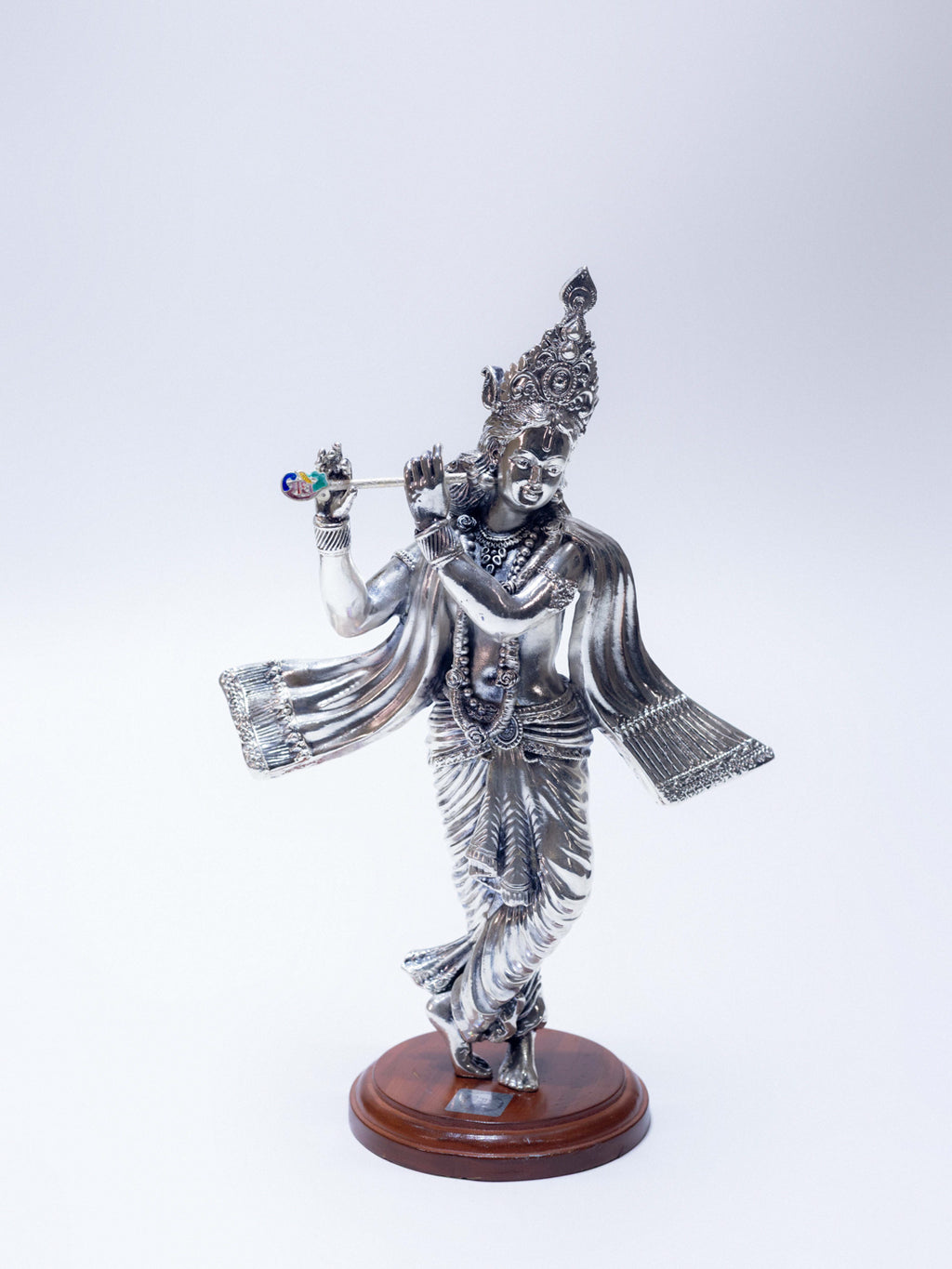 Silver Krishna Ji Playing Bansuri on a Wooden Base