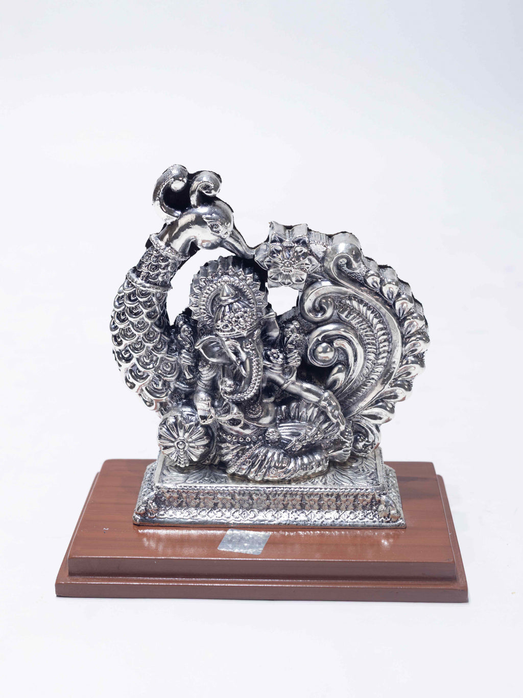 Silver Ganesh Ji Sitting on Peacock Singhasan