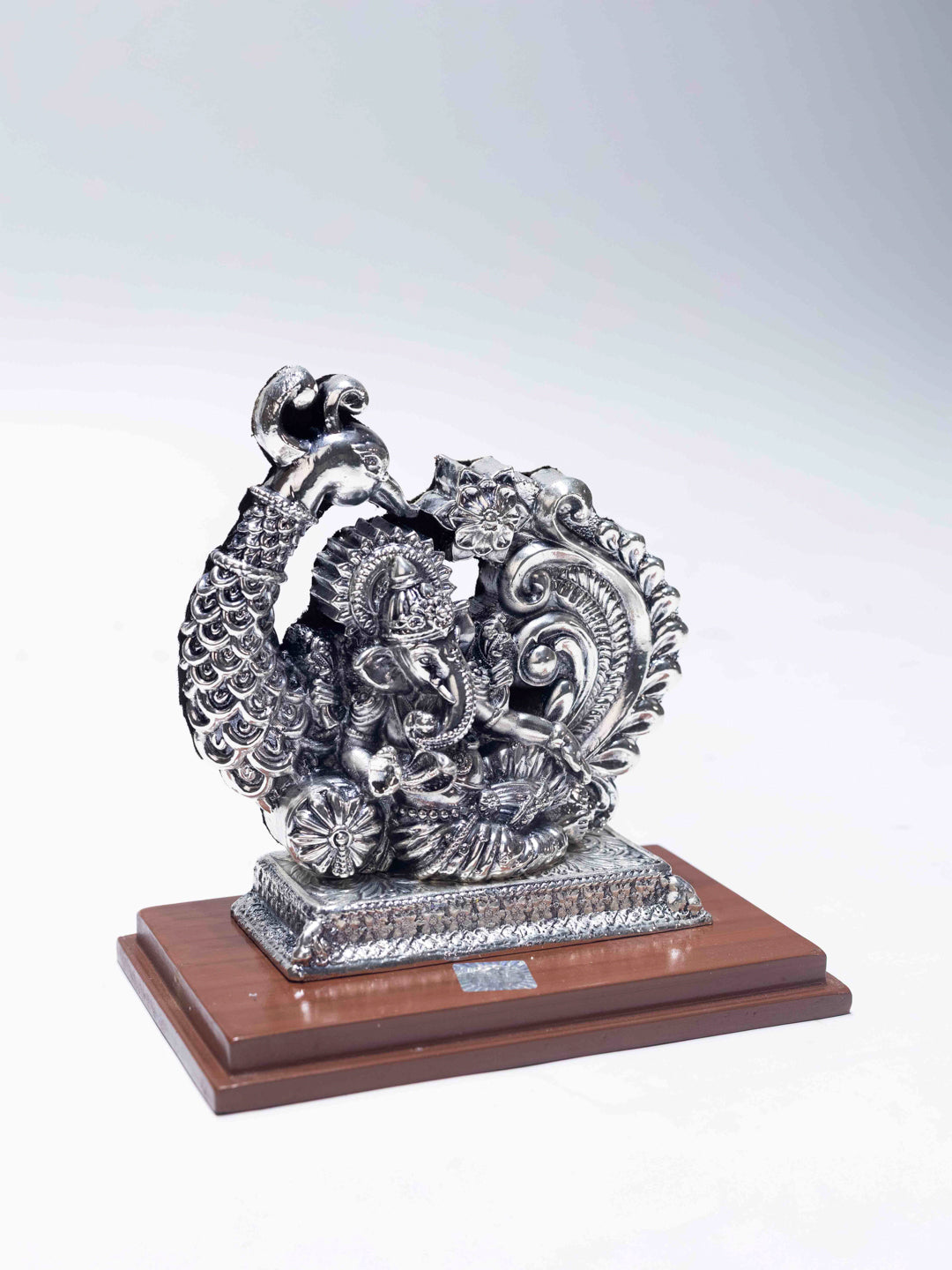 Silver Ganesh Ji Sitting on Peacock Singhasan